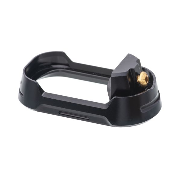 Glock 17 Gen 5 Magwell in black with a gold set screw. Made by Tyrant CNC
